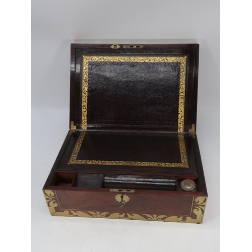 113 - Antique rosewood and brass bound writing slope, finished with brown leather slope