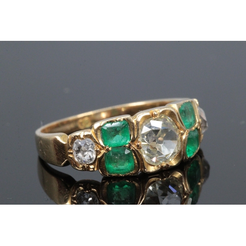 183 - 18ct Diamond and emerald ring, centre diamond size is between a 1/2and 3/4 ct diamond