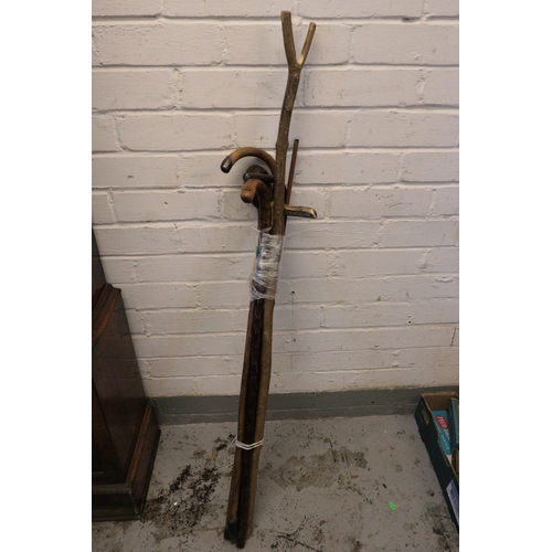 429 - Selection of walking sticks to include silver collared, silver ferruled, yard stick, club?