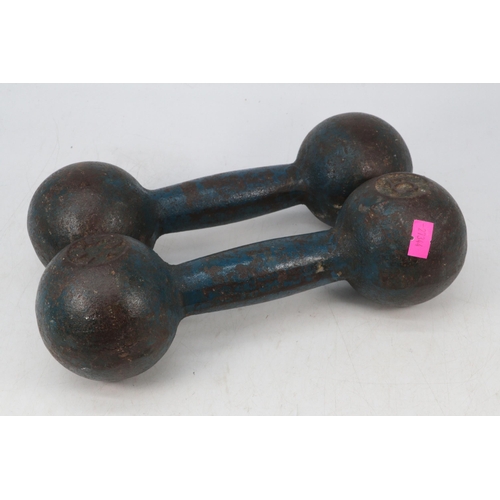 427A - A pair of cast dumbells with embossed no. 5 and Federal