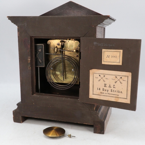 310 - A wooden cased mantle clock