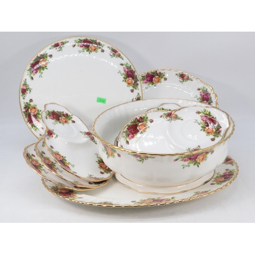 353 - Quantity of Royal Albert Country Roses to include cake stand, Napkin ring, butter dish and more.