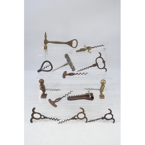 225A - Selection of Antique and later Corkscrews including novelty Lever and others. Also a Book by Evan Pe... 