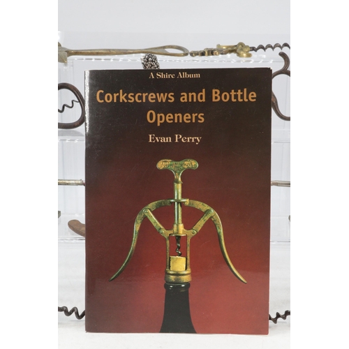 225A - Selection of Antique and later Corkscrews including novelty Lever and others. Also a Book by Evan Pe... 