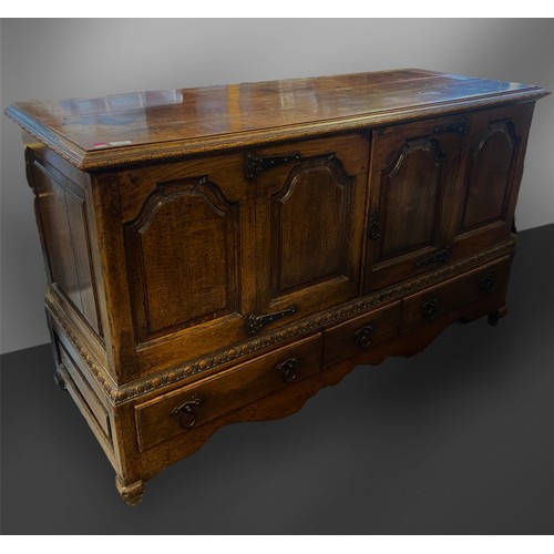 338 - Antique Oak cupboard with two panelled opening doors over three drawers