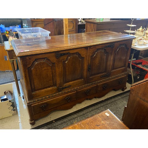 338 - Antique Oak cupboard with two panelled opening doors over three drawers