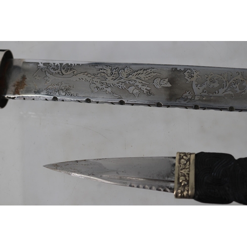 17 - Ornamental Scottish ceremonial sword (blade measures approx 30cm) together with a Sgian Dubh