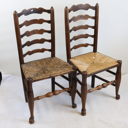 106 - Two Victorian ladderback chairs with rush seats