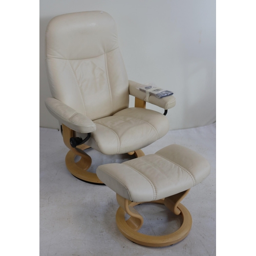 231 - Ekornes stressless recliner and footstool in beige including booklets and info pack