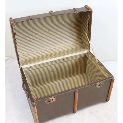 235 - Vintage dome topped trunk with wooden straps.