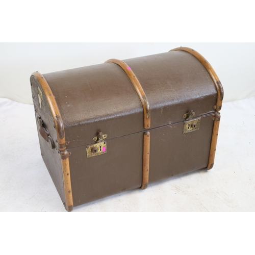 235 - Vintage dome topped trunk with wooden straps.