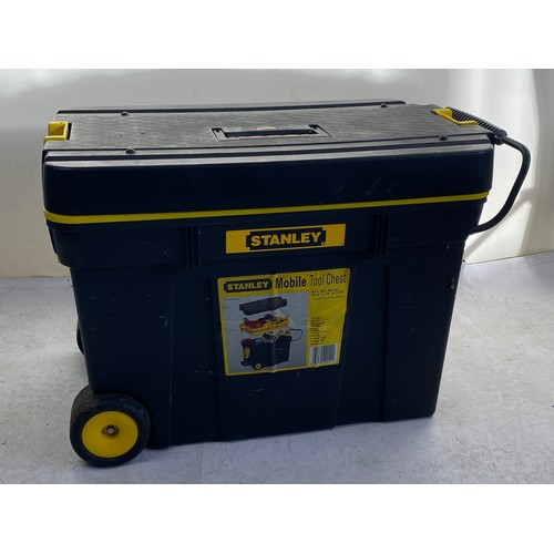 236 - Large Stanley tool chest with pull out handle, on two wheels. Contents is a large quantity of assort... 