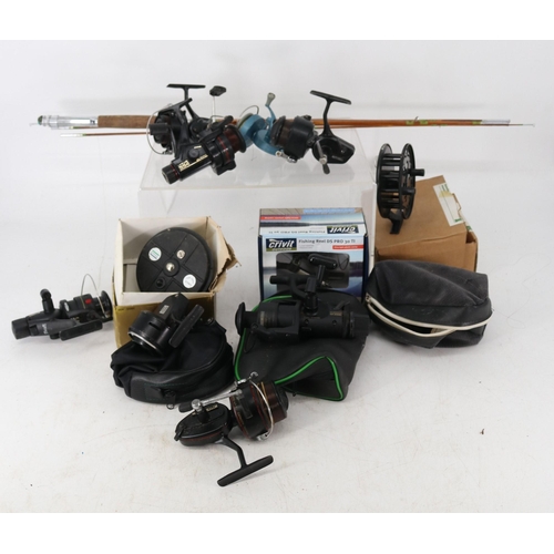 379 - Assorted reels and a Swydun cane rod