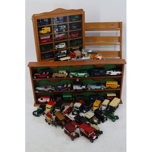 422 - Collection of 50+ model cars and display shelves. Mix of Days Gone By, Matchbox etc