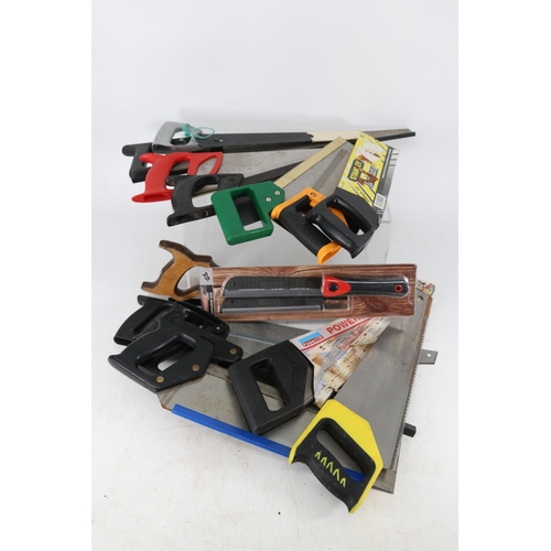 479 - Evolution Fury chop saw, large selection of carpenters saws together with a set of chisels, screwdri... 