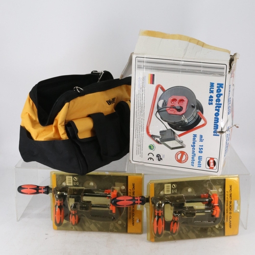 482 - Wolf tool bag, extension lead with halogen lamp, two unused clamp sets. TRADE/SPARES/REPAIRS