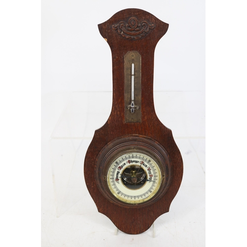 497 - A wooden cased Barometer thermometer