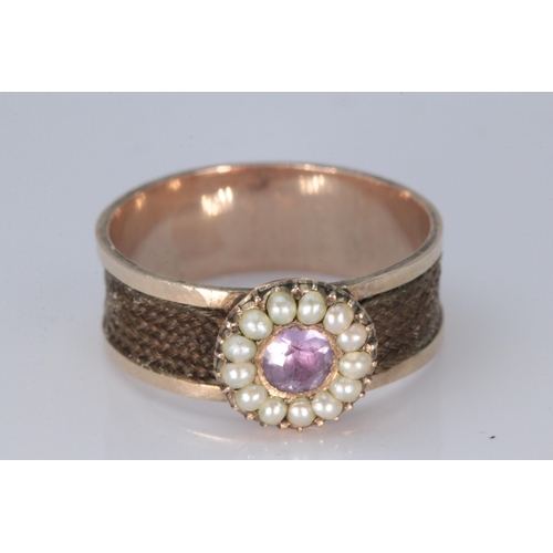 172 - Antique mourning ring set with centre Amethyst surrounded with seed pearls on unmarked yellow metal ... 