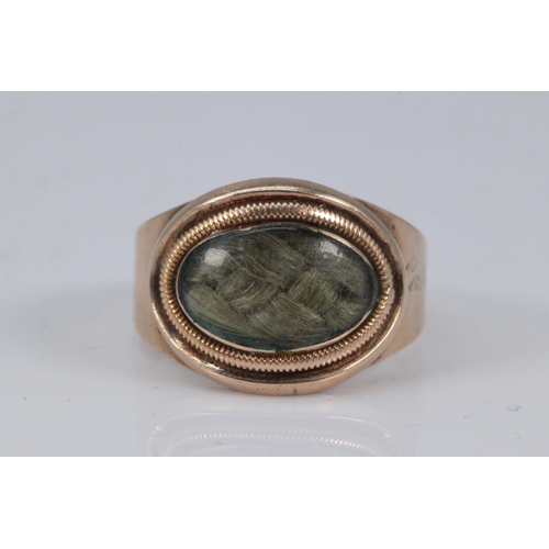 176 - Antique unmarked gold mourning ring with lock of hair to centre engraved on the outside 