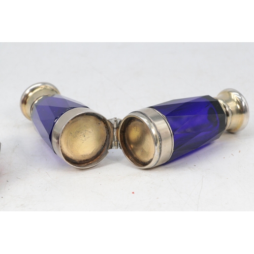 12 - Antique blue glass double ended scent bottle, cranberry similar and a small dual cranberry similar.