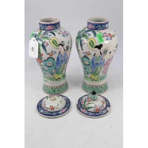 46 - Pair of Chinese famille rose vases with covers, Both showing damage to both covers.