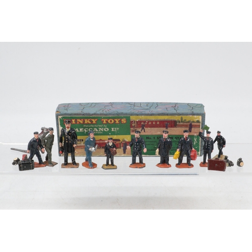 83 - Dinky Toys, station staff, selection of figures and luggage.