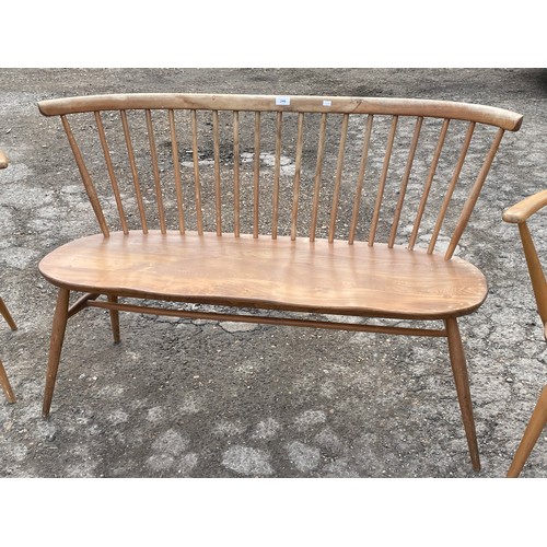 346 - Ercol lovers bench (approx. 108cm wide) showing fading and wear to spindles and backrest together wi... 