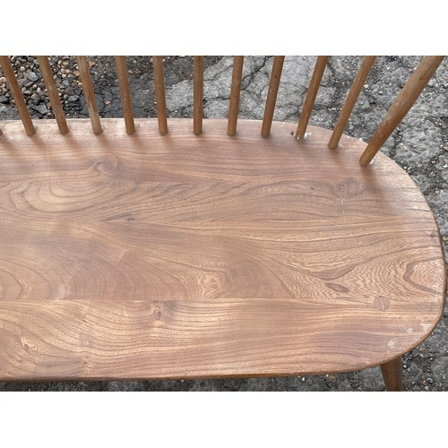 346 - Ercol lovers bench (approx. 108cm wide) showing fading and wear to spindles and backrest together wi... 