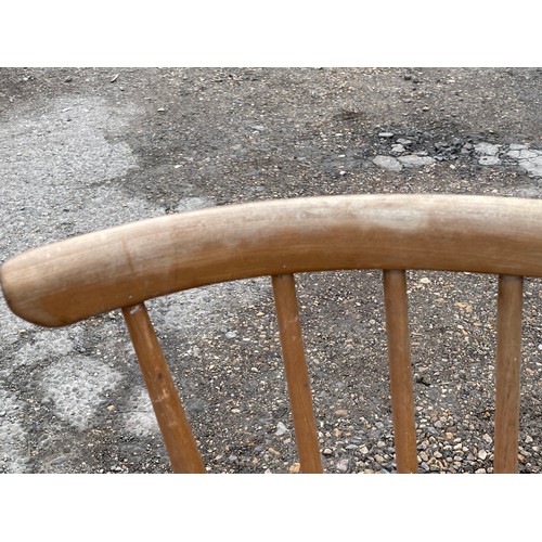 346 - Ercol lovers bench (approx. 108cm wide) showing fading and wear to spindles and backrest together wi... 