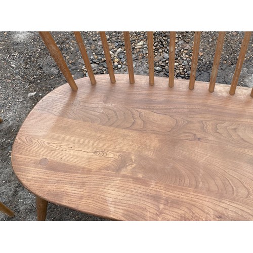 346 - Ercol lovers bench (approx. 108cm wide) showing fading and wear to spindles and backrest together wi... 