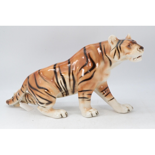 494 - A porcelain Dux ceramic tiger (approx. 55cm overall length)