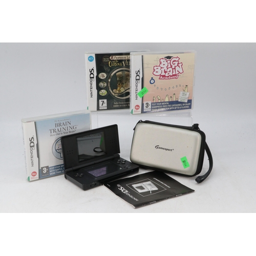 505 - A Nintendo DS with a selection of games including Brain Training