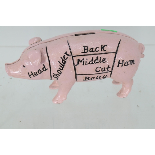 29 - A Harrisons Ham cast moneybox. measures approx. 18cm