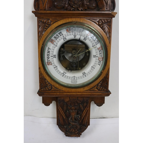 47 - Edwardian oak and carved barometer/thermometer measures approx. 108cm h