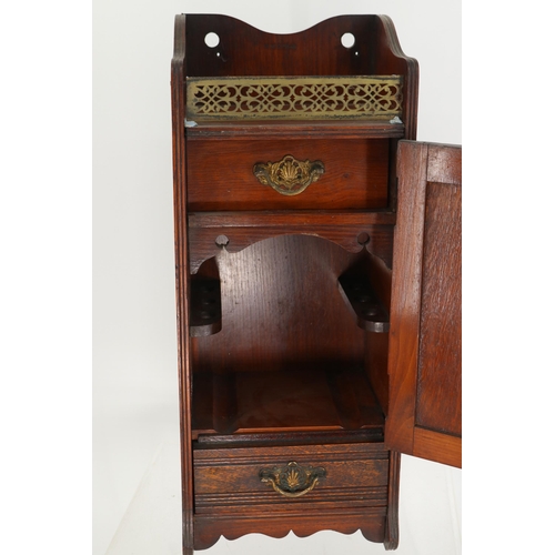 183 - Smokers pipe cabinet with embossed registration mark and carved door (note brass gallery is attached... 