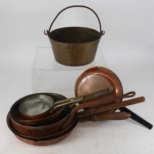 212 - Quantity of brass and copper pans together with a Milbro waterless cooker with instructions.