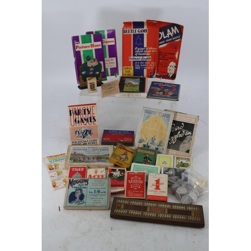 252 - Quantity of Parlour games many dating from the 30's, packs of cards etc