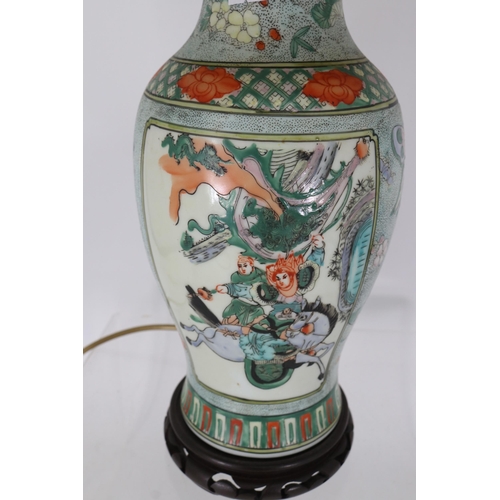 296 - A ceramic Japanese lamp. trade - spares or repairs.