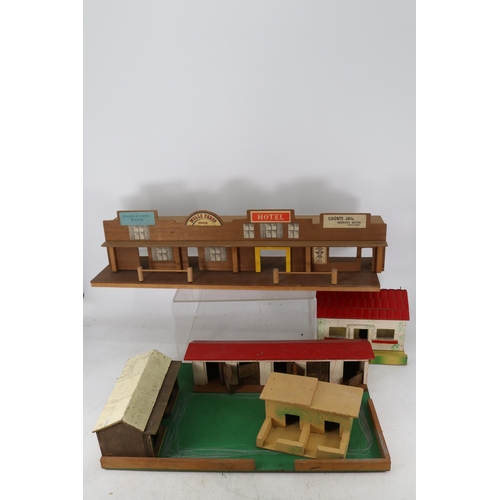 317 - Selection of scratch built toys to include wild west street, farm yard, stable together with two for... 