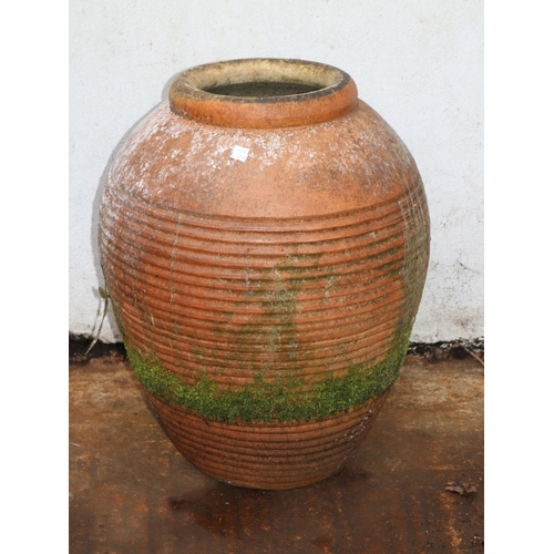 346 - Ridged terracotta pot measures approx. 62cm tall