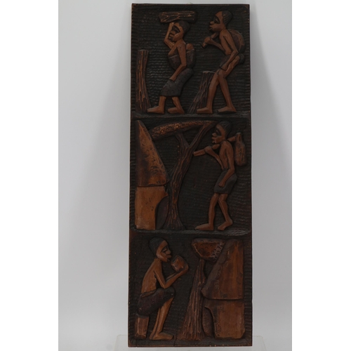 377 - Two framed works of art together with a carved African panel measuring 83cm