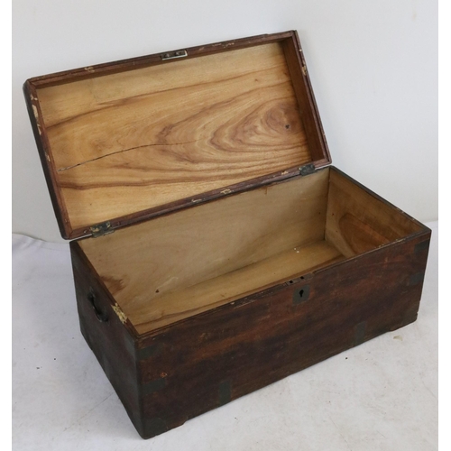 413 - Vintage camphor wood trunk with a vacant brass cartouche measures approx. 89cm w x 46cm d x 42cm h