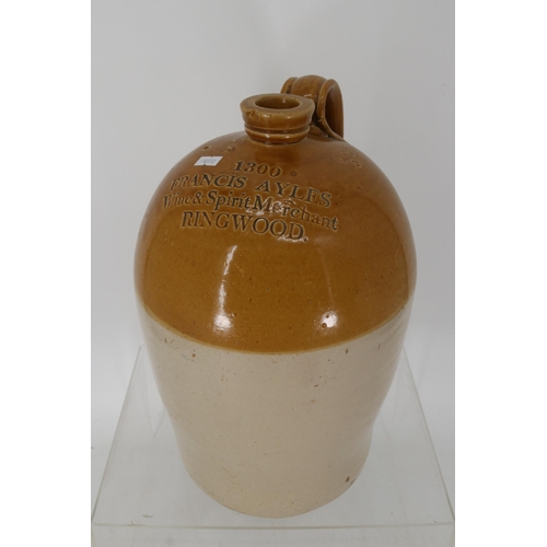 421 - A large stone flagon measuring approx. 38cm from Francis Ayles, Wine & Spirit Merchant, Ringwood. Ma... 