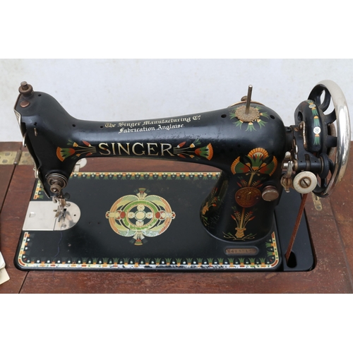 431 - Vintage table top singer sewing machine model number 66, export model on cast base with original rec... 