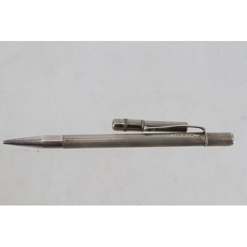 12A - Onoto De La Rue number 14 ink pen together with a silver retractable pencil, various pens and two pe... 