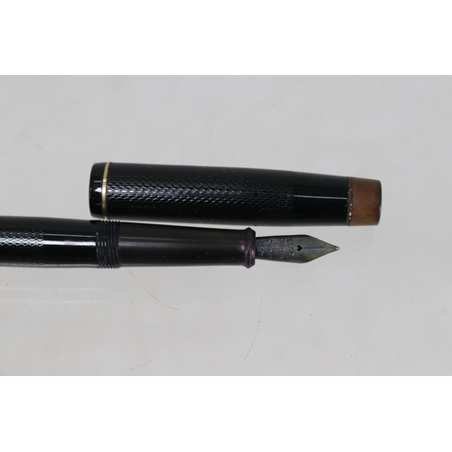 12A - Onoto De La Rue number 14 ink pen together with a silver retractable pencil, various pens and two pe... 