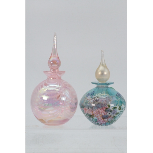 42 - A glass scent bottle,  Renior design by James Harris together with a pink swirl scent bottle