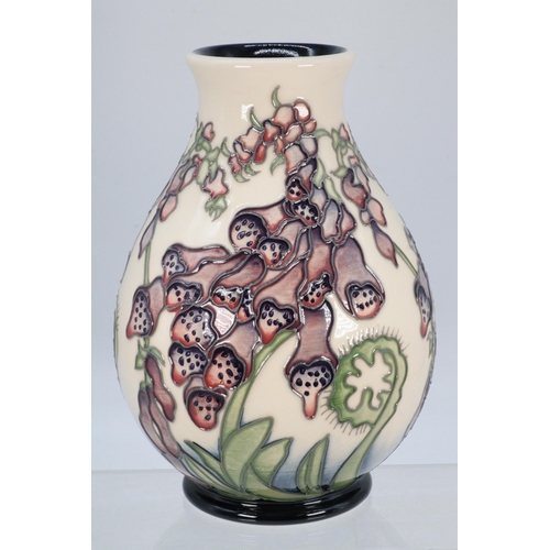 97 - Moorcroft, Fairies Foxglove design vase, approx. 18cm tall, designed A Davenport fully marked to bas... 