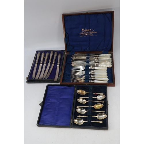 139 - 7x plated apostle spoons, mother of pearl handled fish set and a set of Silver? handled knives.