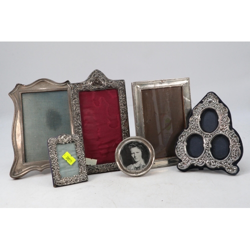 20 - Six silver photo frames, 5 antique and 1 contemporary